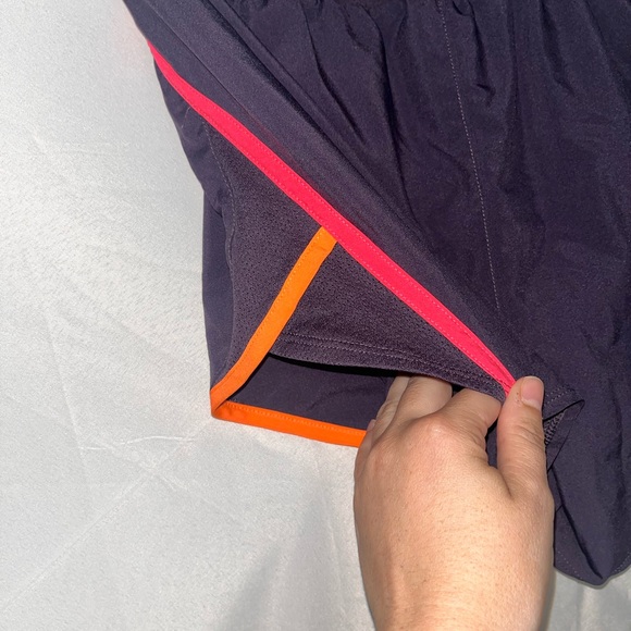 Under Armour Women's Purple Running Shorts with Neon Orange and Pink Accents - Picture 3 of 12